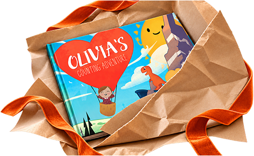 A personalised book, More Than I Can Count, unwrapped from brown paper and ribbon